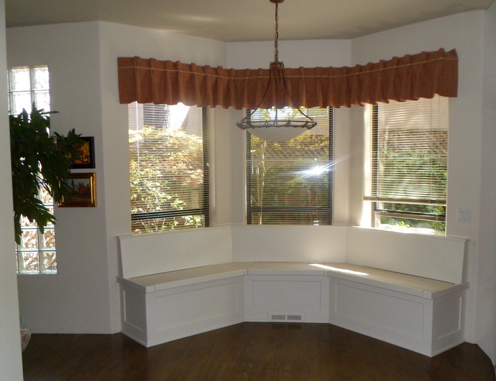 bay window seat with angled back and lift up lids