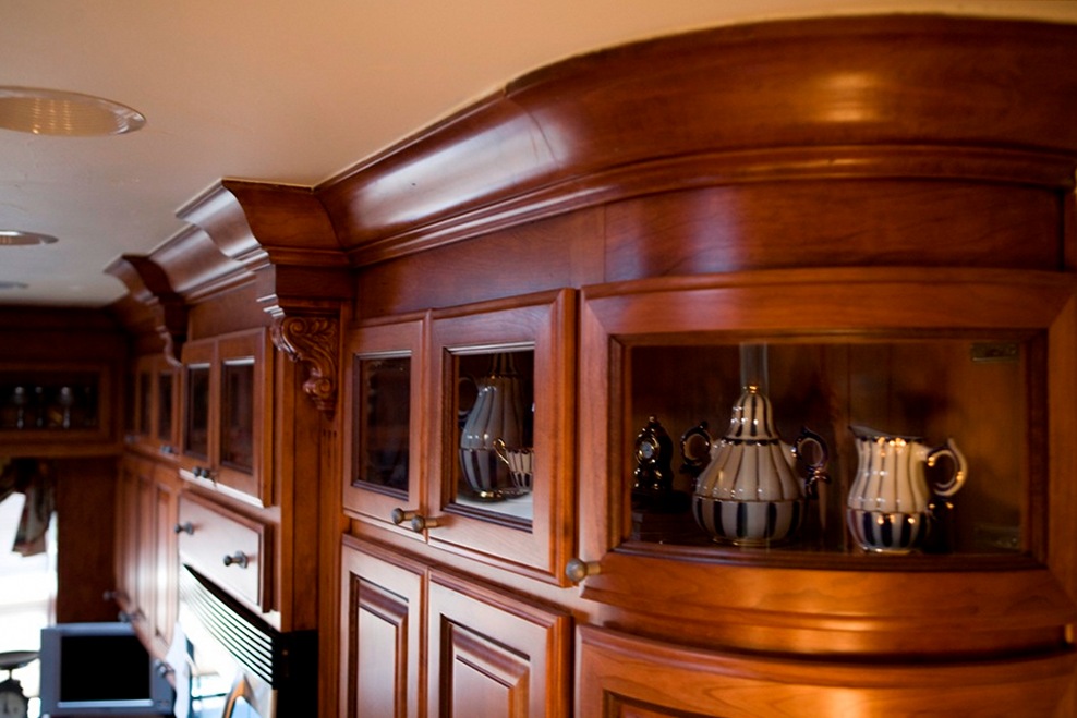 curved cherry crown molding on radius wall cabinet 