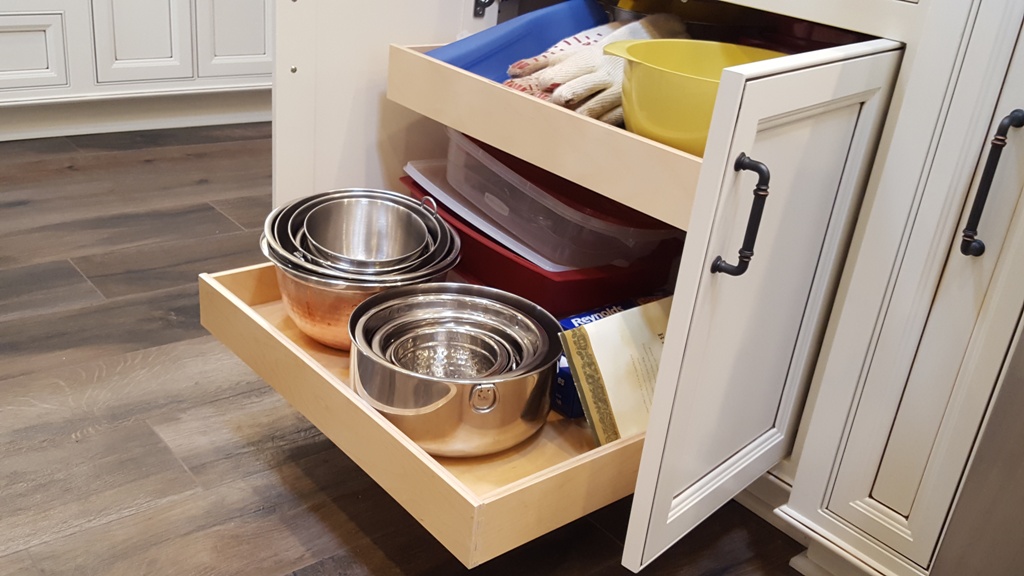 kitchen base cabinet with dovetailed rollouts.