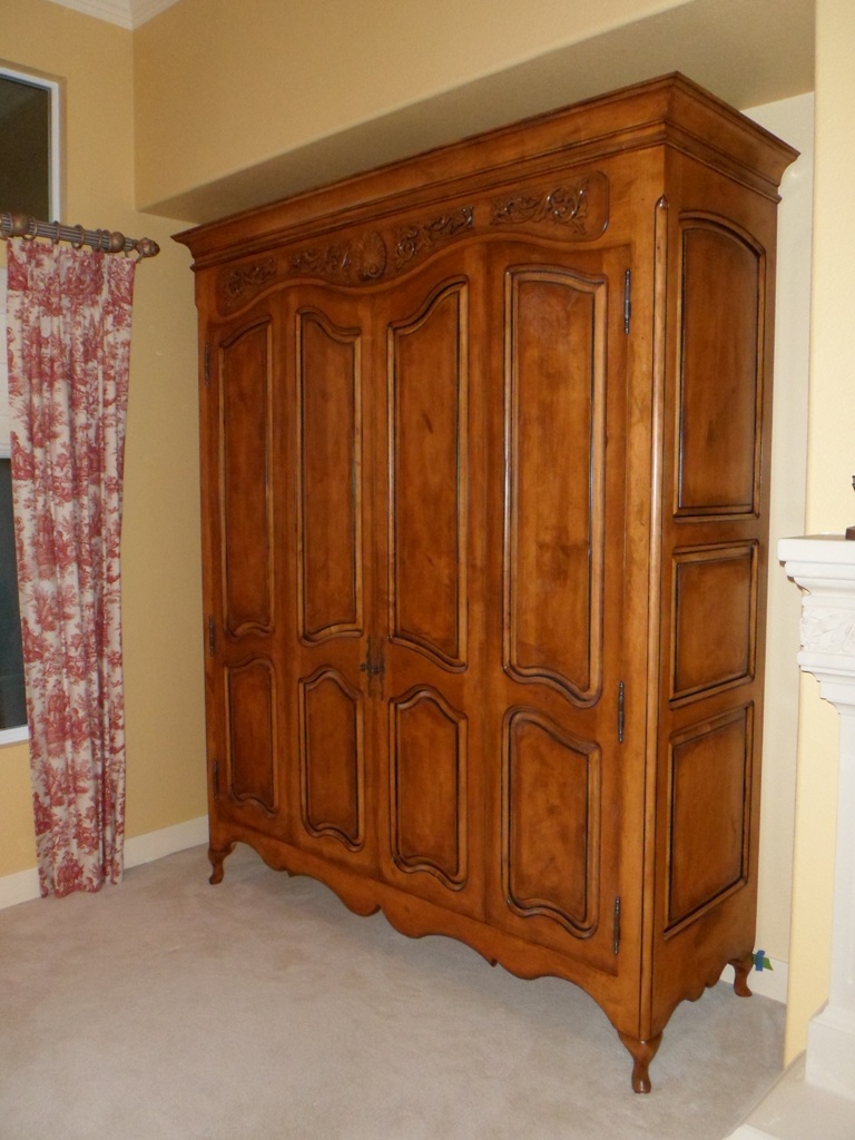 French armoire style custom cabinet media center