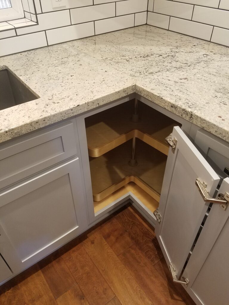 base corner cabinet with novaply interior and solid wood lazy susan.