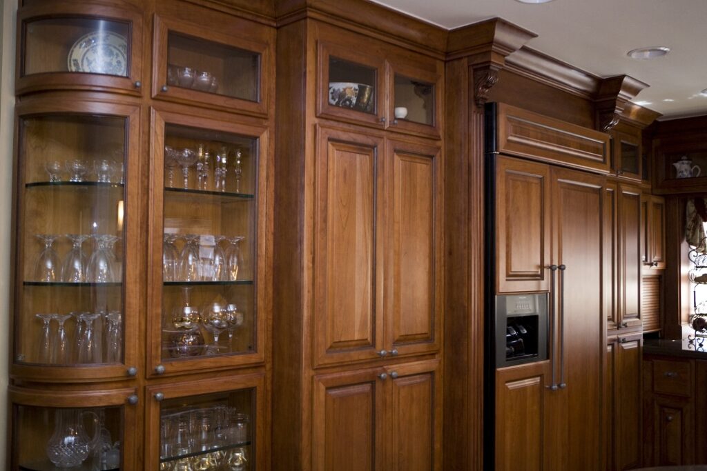 cherry raised panel doors on custom kitchen pantry unit