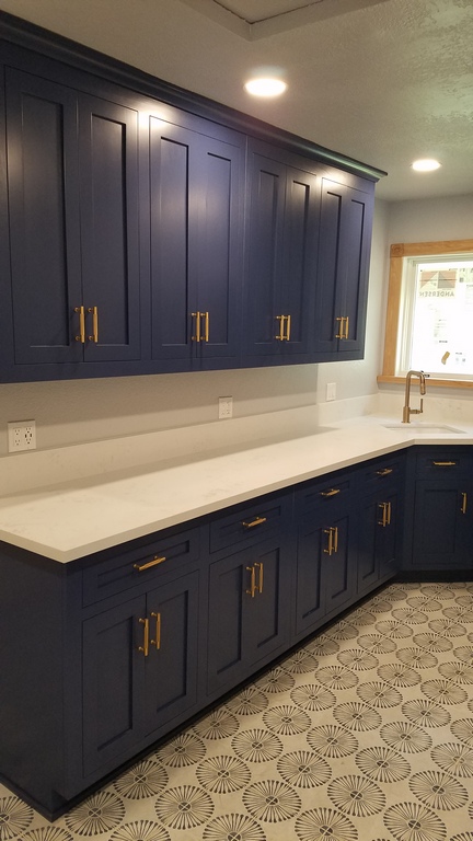 solid color shaker style flush inset  laundry room cabinets with dovetailed drawers